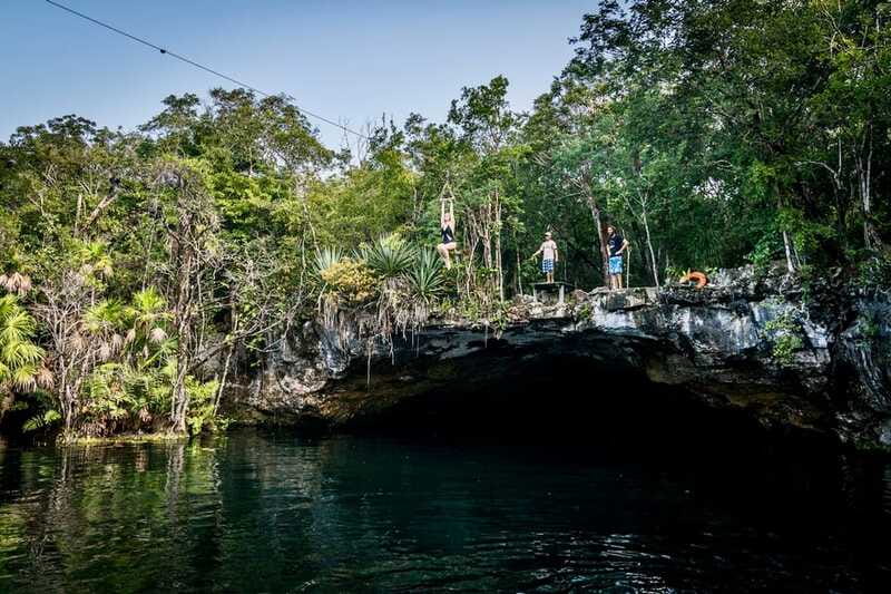 From Tulum: Four-Cenote Adventure - Large Cenote Naval: two zip lines plus canoe time
