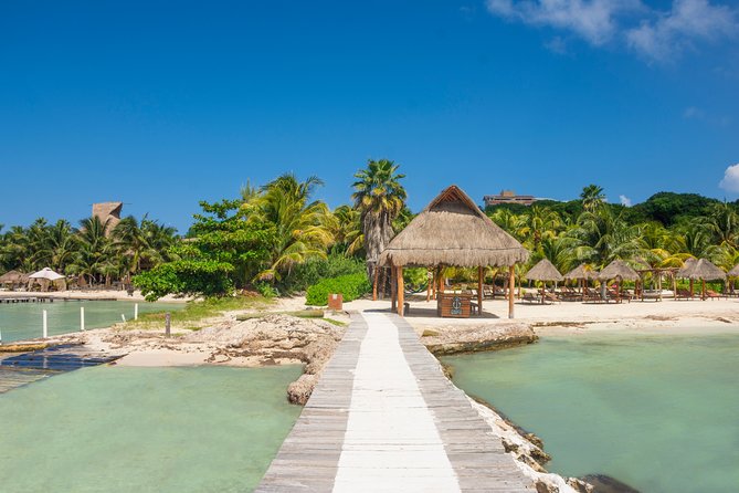 Full-Day Luxurious Catamaran Adventure - Cancún to Isla Mujeres - Onboard vibe: crew service and drinks are the main event