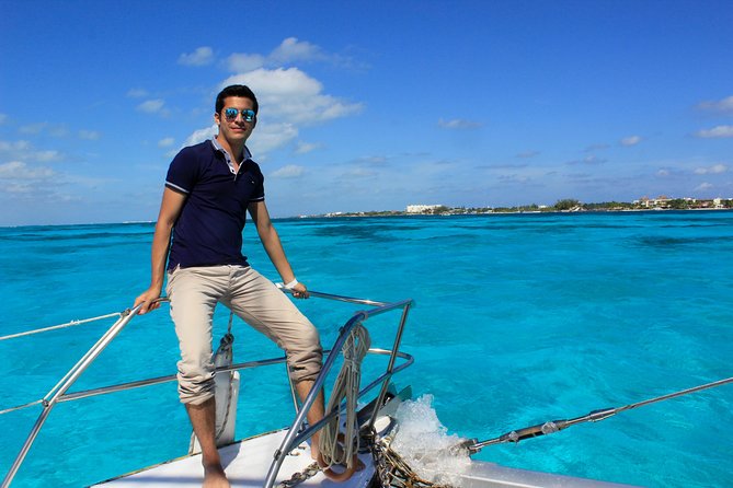 Full-Day Sailing Trip to Mujeres Island from Playa del Carmen - The guide’s stories: wildlife plus big-name history on Isla Mujeres