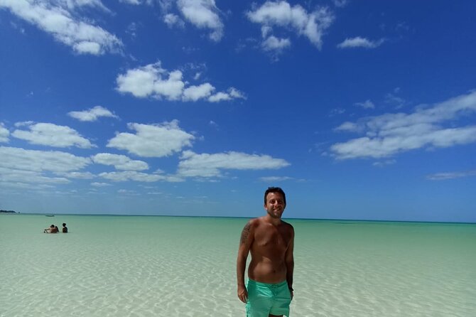 Holbox Island Tour Golf Cart Ferry with Lunch and Transportation - Stop 2, Punta Mosquito: A Sea-Only Beach and Flamingo Season Clues