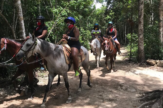 Horseback riding with ATV, zip lines and cenote, lunch and transfer - Zip lines first: harness quality, what to expect, and the cenote theme