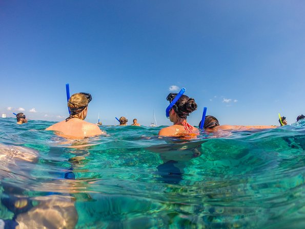 Isla Mujeres Catamaran, Open Bar & Optional Buffet and pick up - Catamaran ride comfort and the open bar vibe (30 vs 50 passengers)