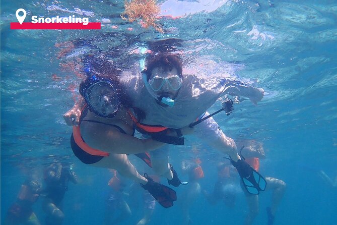 Isla Mujeres Catamaran + Snorkel + Open Bar on board + Buffet - Isla Mujeres time and the beach club buffet: how to get the most from your island window