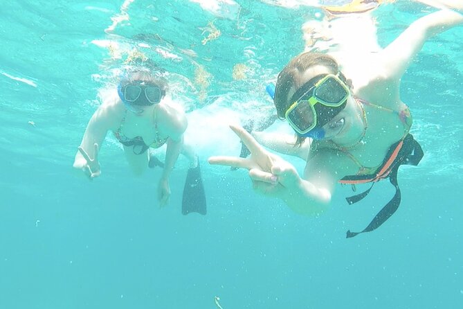 Isla Mujeres Catamaran Tour from Cancun with Snorkel and Open Bar - The Catamaran Ride: Sun Deck, Music, and the Open Bar Situation