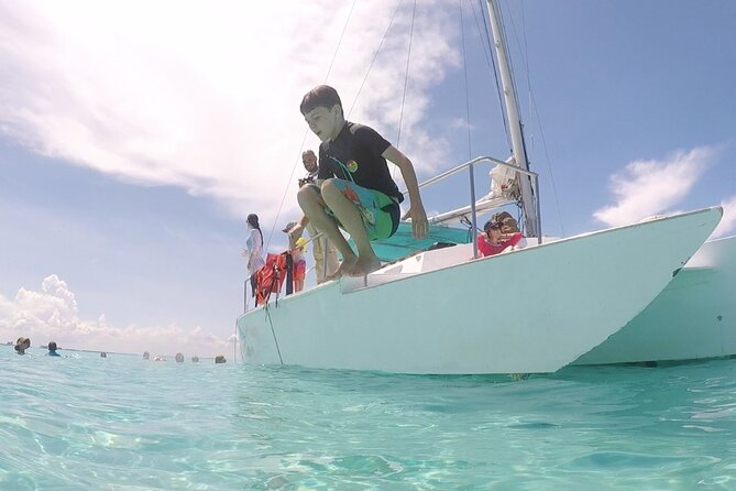 Isla Mujeres Catamaran Tour from Cancun with Snorkel and Open Bar - Beach Club Lunch: Ocean Views and Vegan Options
