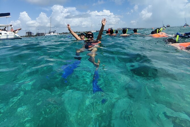 Isla Mujeres Catamaran Tour from Cancun with Snorkel and Open Bar - Spinnaker Flying: Weather Permitting Extras