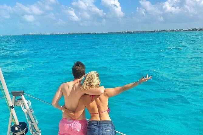Isla Mujeres Catamaran Tour with Snorkel, Open bar and Transport - Playa Norte and island time: beach views plus real-life crowds