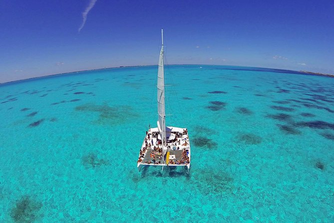 Isla Mujeres Catamaran Tour with Snorkeling at MUSA, Buffet Lunch & Open Bar - Isla Mujeres Free Time: Beach Club Lunch, Downtown Shops, and Playa Norte