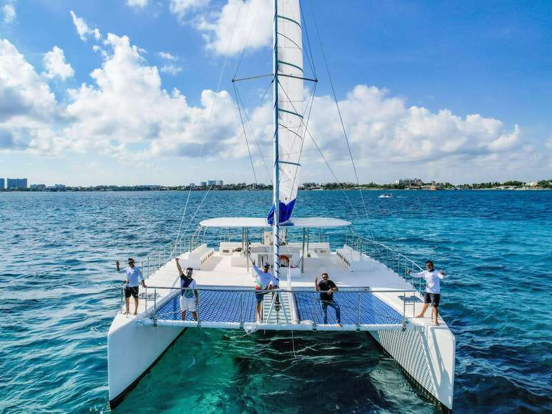Isla Mujeres: Catamaran with Open Bar, Snorkeling and Lunch - Isla Mujeres free time: walking, shopping, or going fast with golf carts