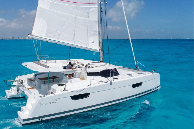 Isla Mujeres Cruise with Beach Club, Snorkel, Lunch and Open Bar - Open bar and loud music: the party factor is real