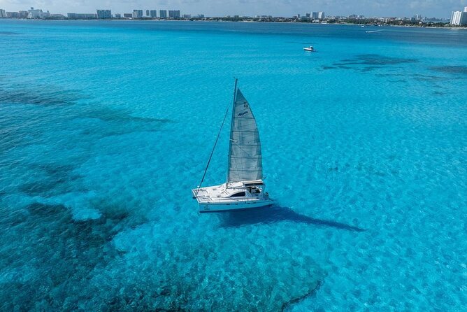 Isla Mujeres Day Tour with Catamaran, Snorkeling & Beach Club - Getting Oriented at Marina Las Perlas and the Check-In Mood