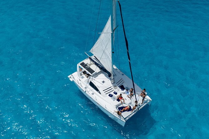 Isla Mujeres Day Tour with Catamaran, Snorkeling & Beach Club - Snorkeling at Bahia Mujeres Reef: What the Timing and Water Feel Like