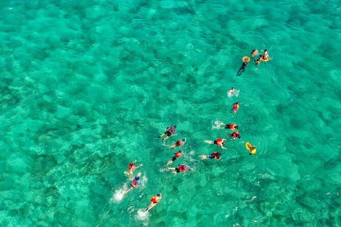 Isla Mujeres Island and Snorkeling Tour - Playa Norte snorkeling: clear water, crowd control, and your best chance