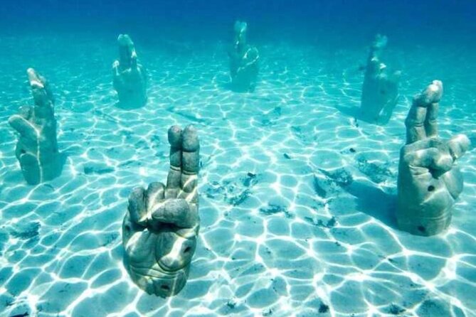 Isla Mujeres on luxury catamaran with snorkel, open bar and lunch - Stop 2: Isla Mujeres free time, beaches, and souvenir time