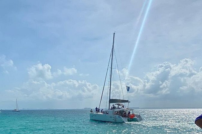 Isla Mujeres on luxury catamaran with snorkel, open bar and lunch - Premium open bar: fun add-on or factor in your pacing