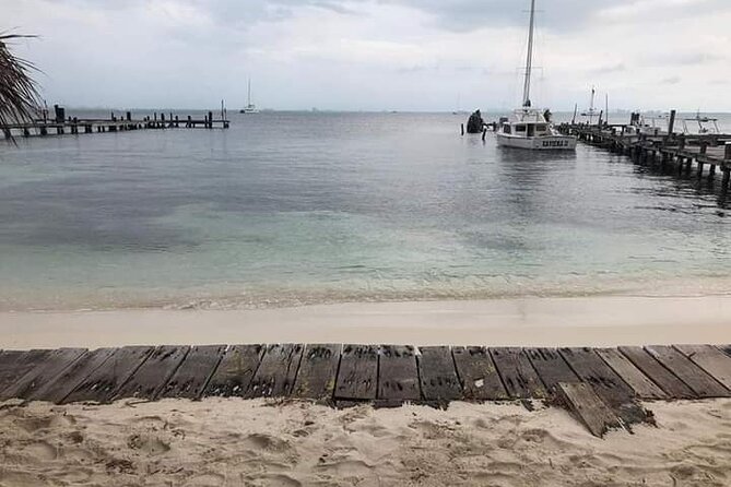 Isla Mujeres Premium Tour in Private Catamaran with Lunch - Stop 2: Arrecife El Meco, fish, underwater statues, and what you should expect