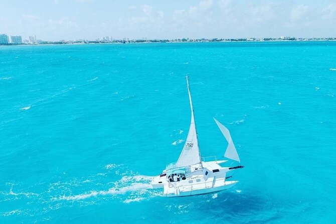 Isla Mujeres Premium Tour in Private Catamaran with Lunch - Stop 1: Playa Tortugas, timing, snorkeling readiness, and the dock tax
