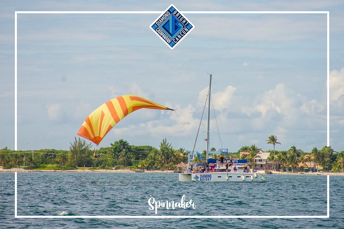 Luxury Catamaran tour to Isla Mujeres with Transportation from Cancun - Sunset spinnaker fly: the crowd-pleaser, if conditions allow