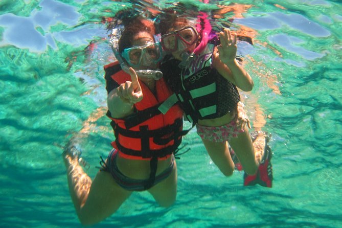 Official Chankanaab Beach Park Day pass with Snorkel - Small risks to plan for: tides, flags, and park hours