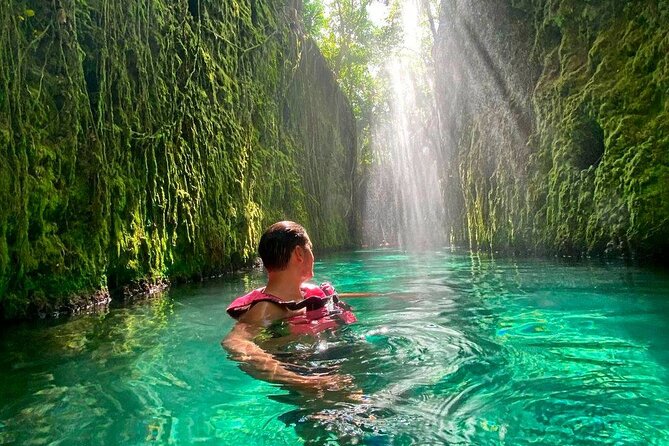 Park Xcaret Plus with Transportation from Cancun and Riviera Maya - Entering Xcaret: water-park energy with a jungle setting