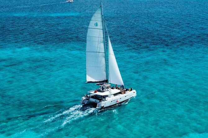 Plus Full Day Catamaran Tour to Isla Mujeres All Inclusive - Entering Isla Mujeres by Catamaran: The Punta Sur Dock Plan