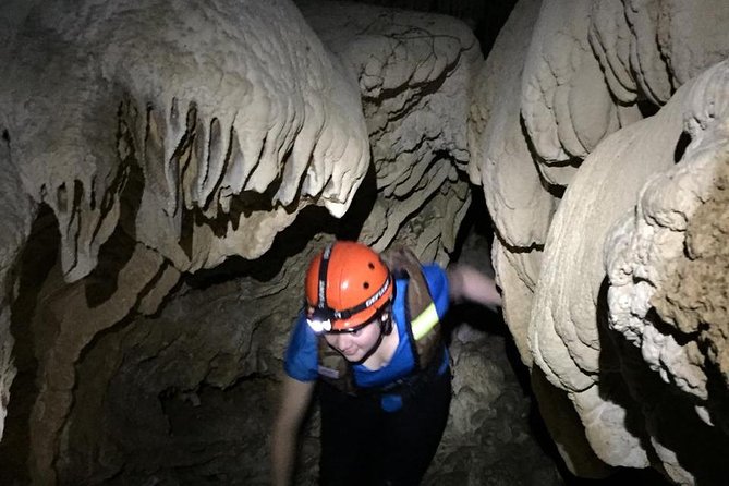 Private ATV Jungle & Cave Adventure - Inside the cenote and cave: flashlights, an underground river, and the swim