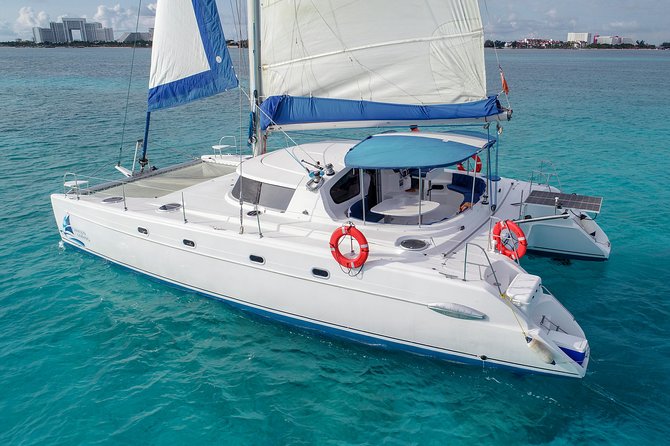Private Catamaran from Cancun to Isla Mujeres | For up to 30 pp - Crew service: what good sailing staff looks like