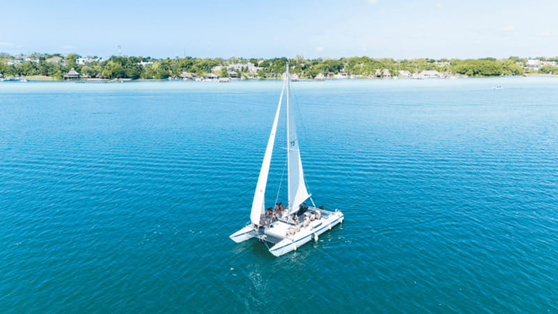 Private Hobie Cat Sailing Tour - Black Cenote stop: seeing why it is called Black