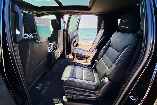 Private Luxury SUV Transfers from Tulum Airport - Flight tracking, WhatsApp updates, and the name-tablet meet