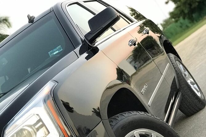 Private Transportation by SUV from the Airport to Cancun Hotel Zone - The pickup moment: name sign, mobile ticket, and how the meet works