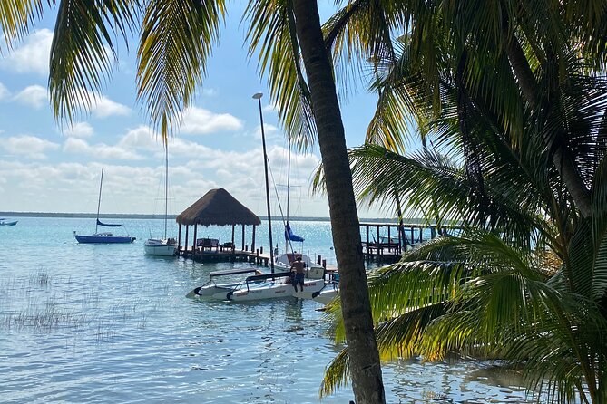 Sail away! Hobie Cat Tour Bacalar - Margaritas on board, plus swimming time