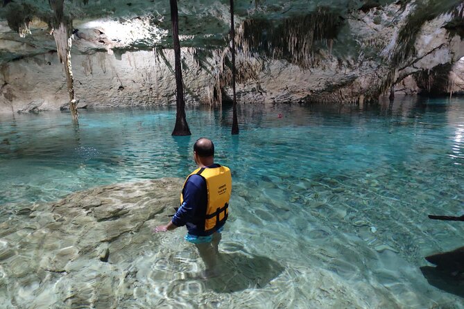 Small group tour in Tulum Ruins - Cenote Cave and GoPro pictures - Stop 2: Cenote Taak Bi Ha, snorkeling with water lanterns, and flooded-cave formations