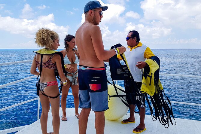 Tour to Cozumel by Catamaran with Snorkeling and Buffet Lunch - The big picture: reefs, sailing, and a beach club reset