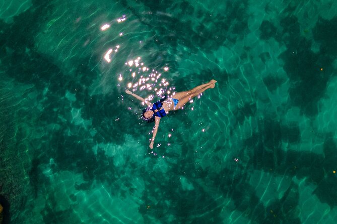 Tulum Guided Tour, Magical Cenote, Lagoon Snorkeling and Beachside Lunch - Yal Ku Lagoon Snorkeling: Where Freshwater Meets Sea Water