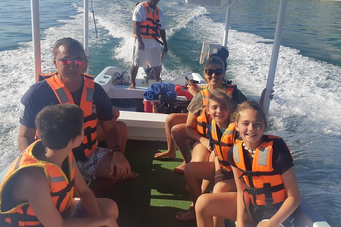Tulum Private Boat Tour & Turtle Snorkeling Experience - Playa Pescadores snorkeling with turtles, plus optional beach time