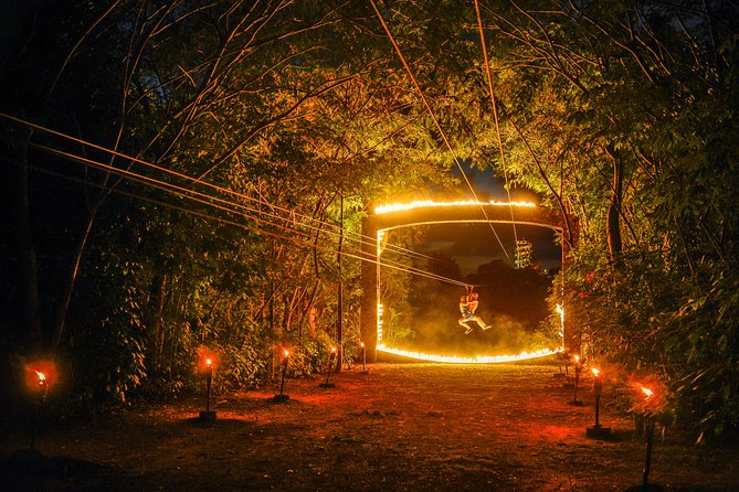 Xplor Fuego with Buffet Style Dinner and transportation - Zip lines at night with fire: what to expect in height and stamina