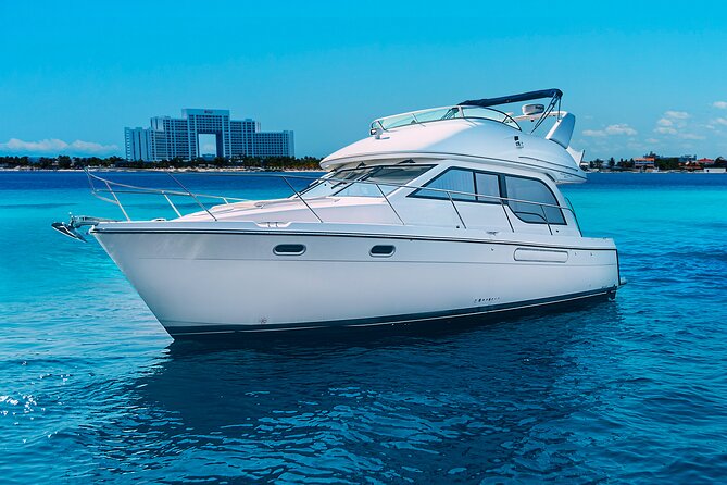 Yacht Meridian 40FT Best Private Rental in Cancun - Isla Mujeres plan: mangroves, shipwreck snorkeling, and Playa Norte time